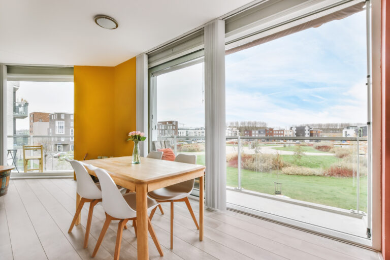 Stylish and cozy dining area with a table and chairs